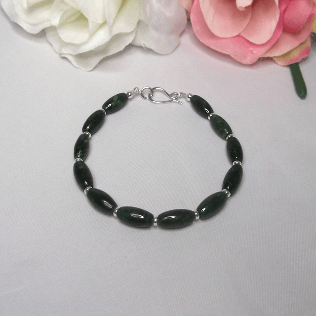 Green Jade gemstone bead bracelet with small recycled silver spacer beads