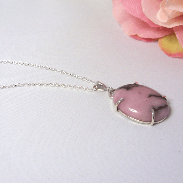 Rhodonite oval gemstone claw set pendant