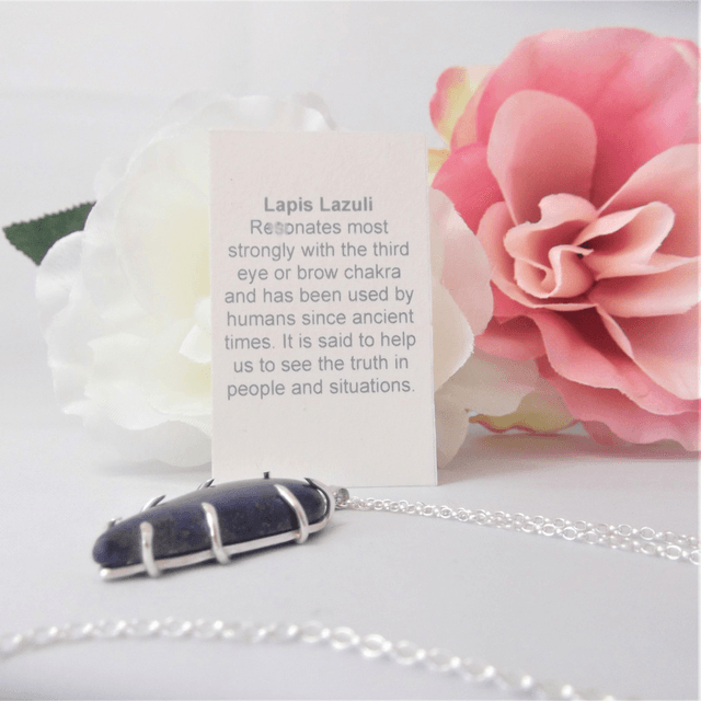 Lapis Lazuli gemstone pendant with recycled silver claw setting