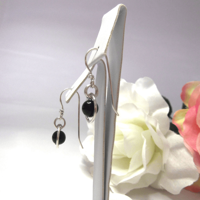 Black obsidian gemstone dangle earrings with bead in a ring of recycled sterling silver