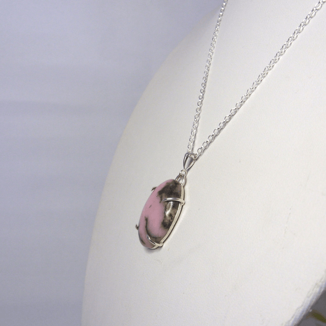 Rhodonite oval gemstone claw set pendant