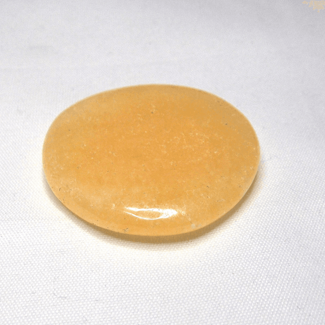 Orange Calcite pocket stone